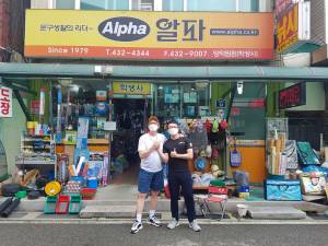 Me and Venedy outside his shop in Yangdeokwon